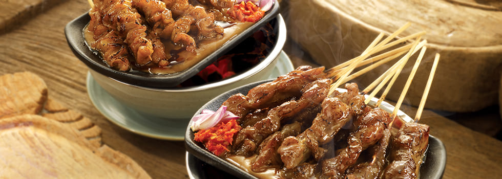 Sate Khas Senayan grilled meat skewers with sauce